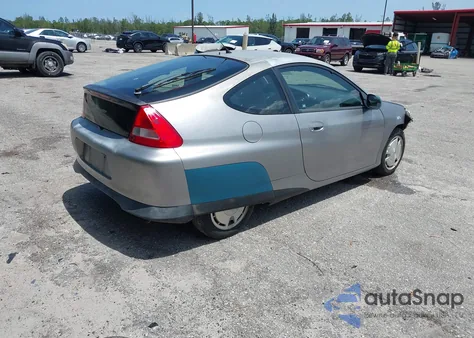 2004 Honda Insight Cvt z USA, uszkodzony, nr VIN JHMZE14744T000527